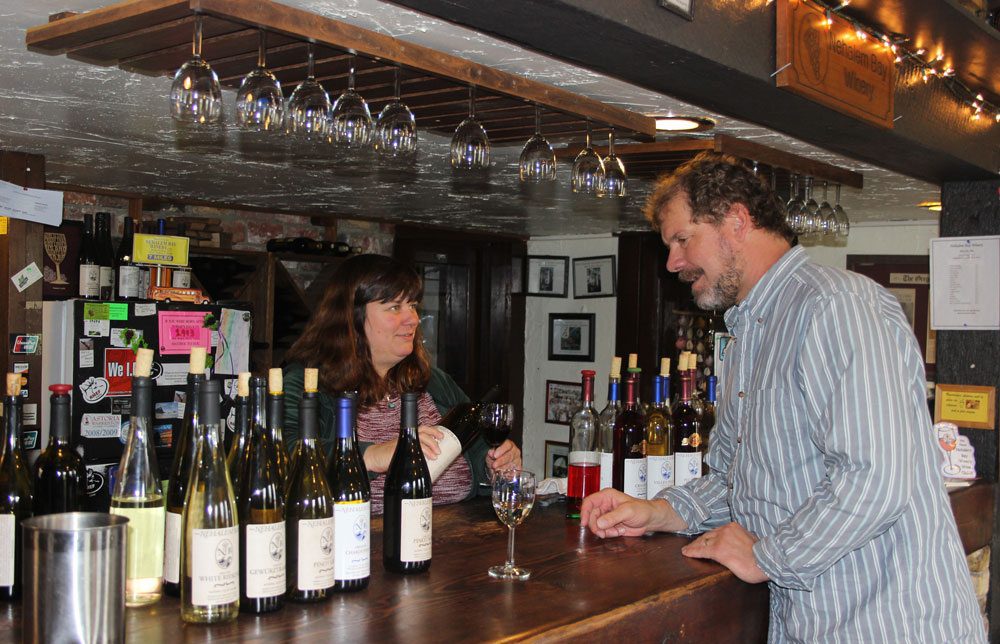 Man orders wine from bartender