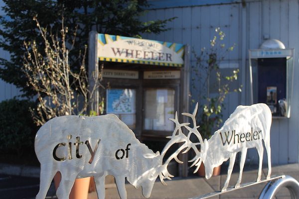 Metal elk sculptures with "City of Wheeler" engraved
